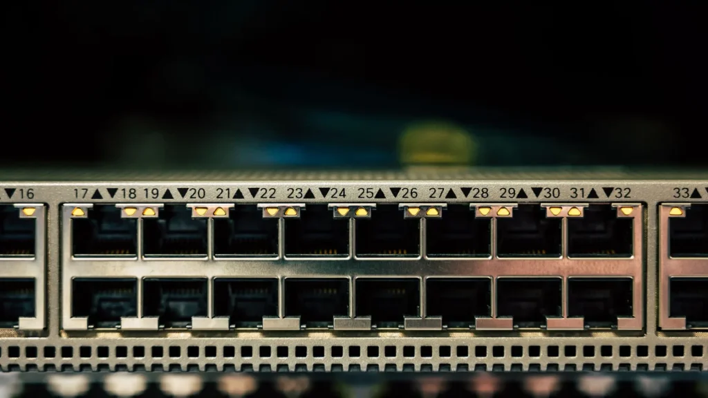 Network switch ports with status lights, used to power IP phones with PoE
